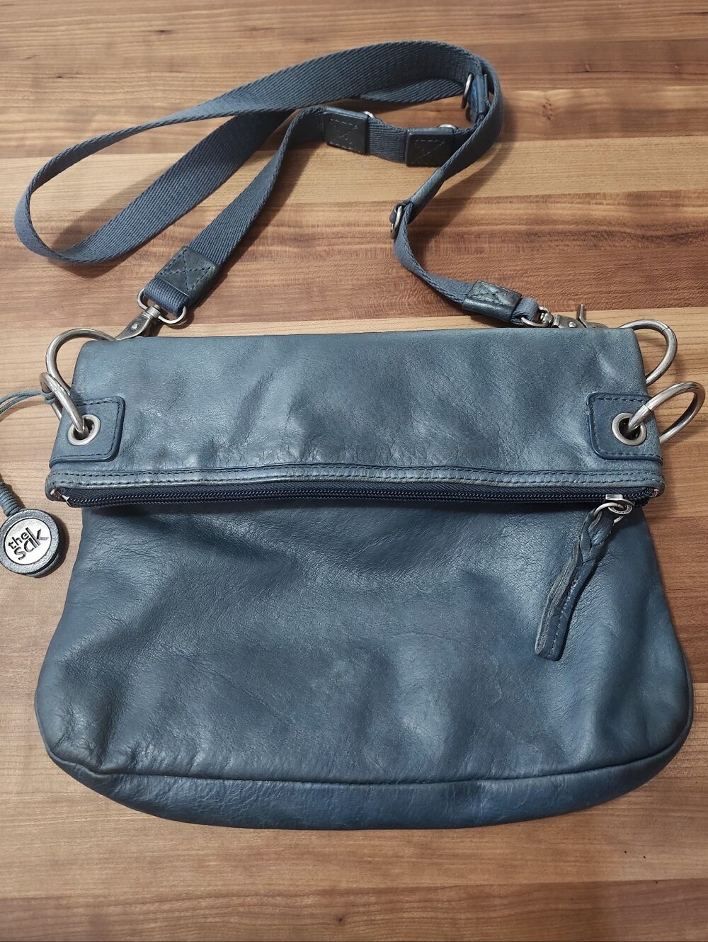 The Sak Pax Blue Leather Crossbody Bag.